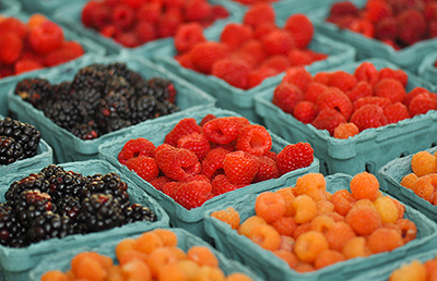 different colored raspberries