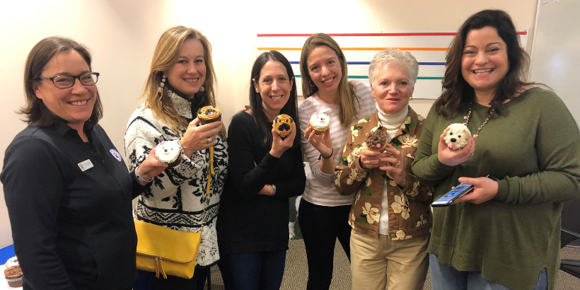 women with guinea pig cupcakes
